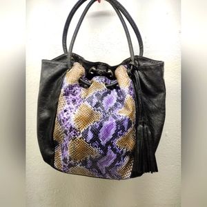 Women's purple and black snakeskin leather handbag with tassles